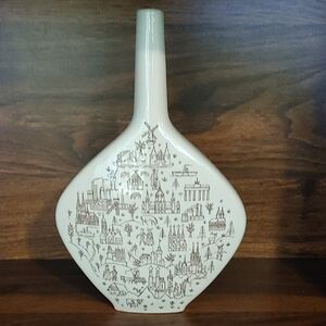 White Ceramic Vase with Brown Illustrations